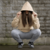 model using not bad clothing hood due tan covering face