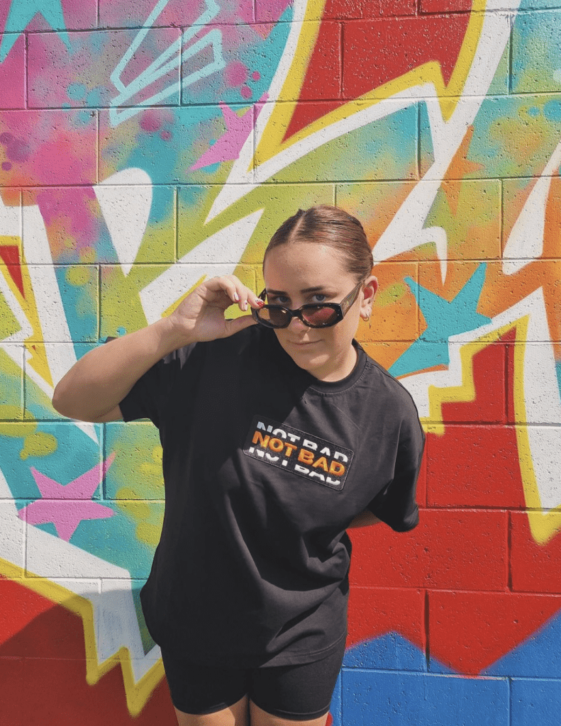 model using Oversized TEE - orange